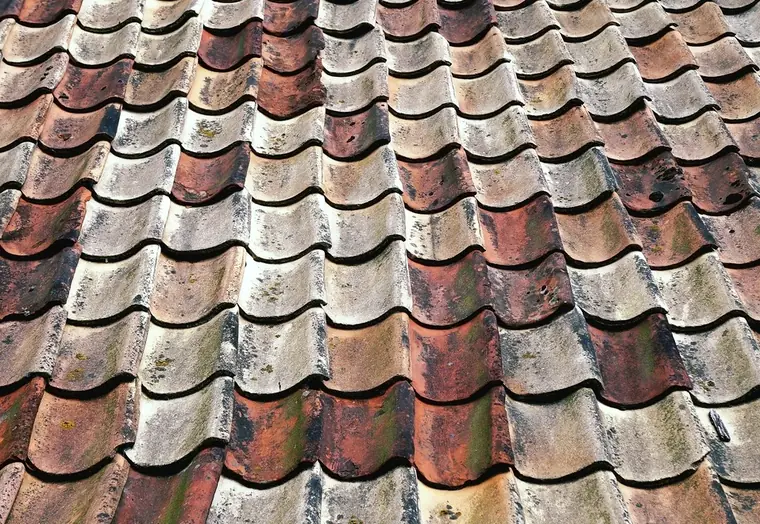 Weathered terracotta roof tiles